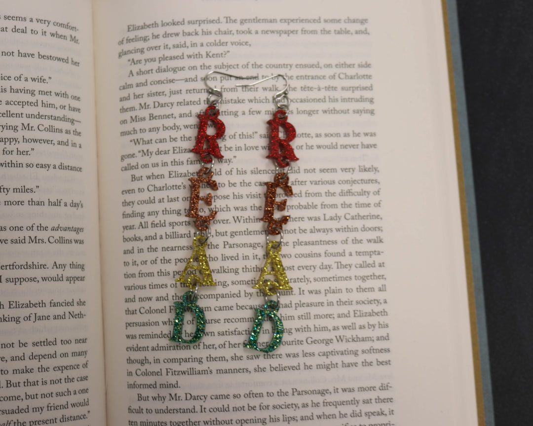 Unhinged Acrylic Earrings In Glitter Read Warm