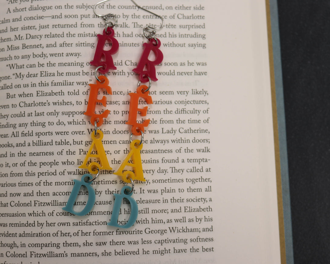 Unhinged Acrylic Earrings In Gloss Read Warm