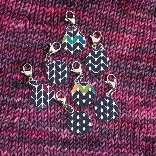 By Design: In Stitches