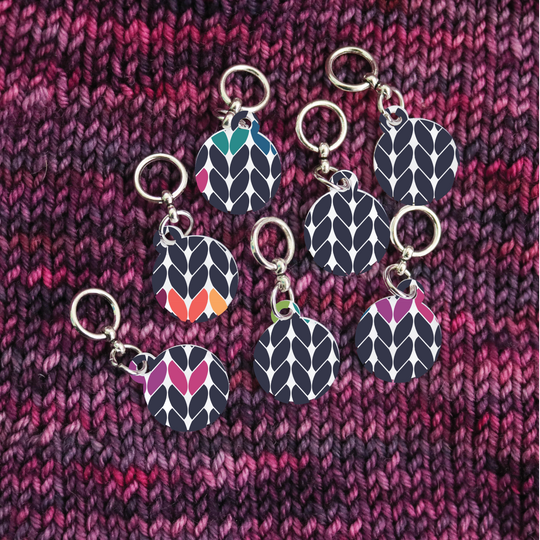 By Design: In Stitches