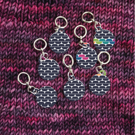 By Design: In Stitches